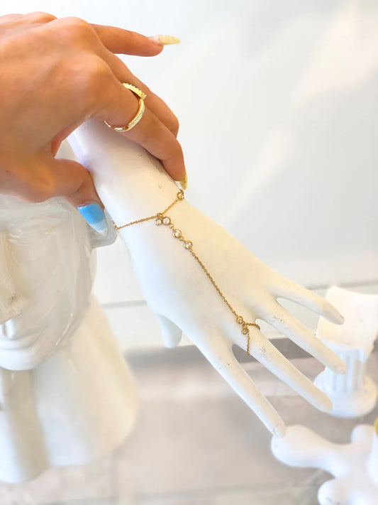 Tina’s white hand chain